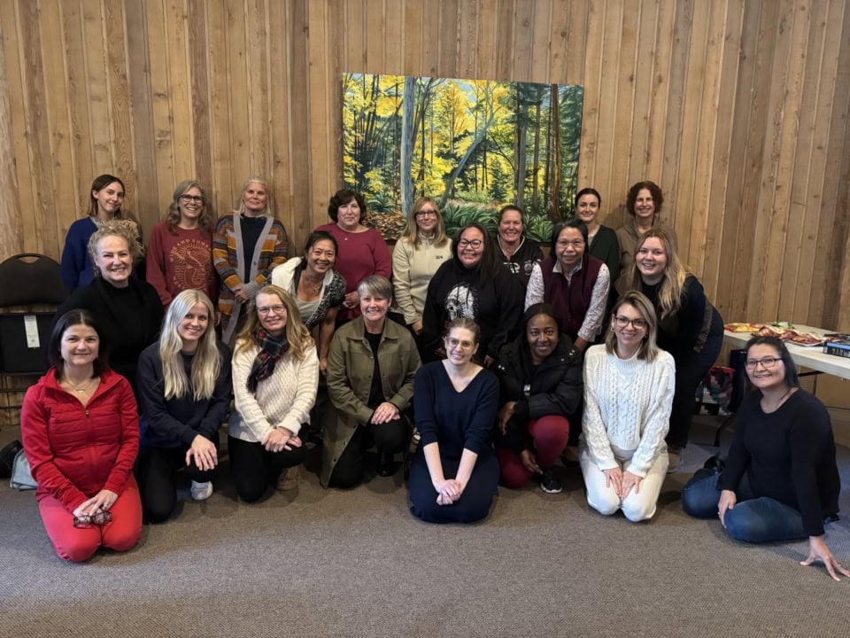 Tracey and attendees of a well being workshop