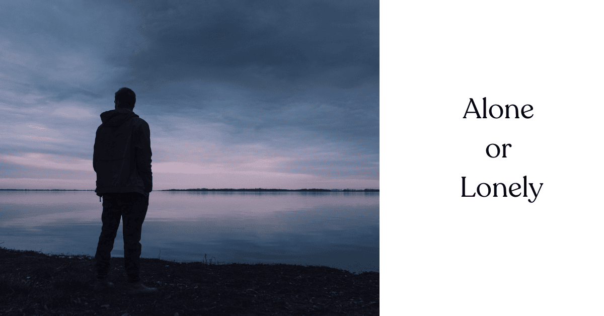 figure alone facing out over ocean